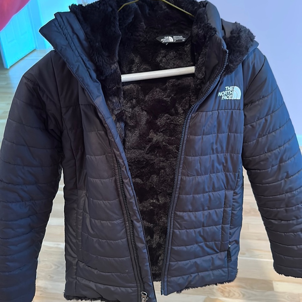 The North Face warm winter jacket.  Size 7-8